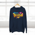 Navy Brooklyn AF graffiti hoodie on a wooden hanger by a window