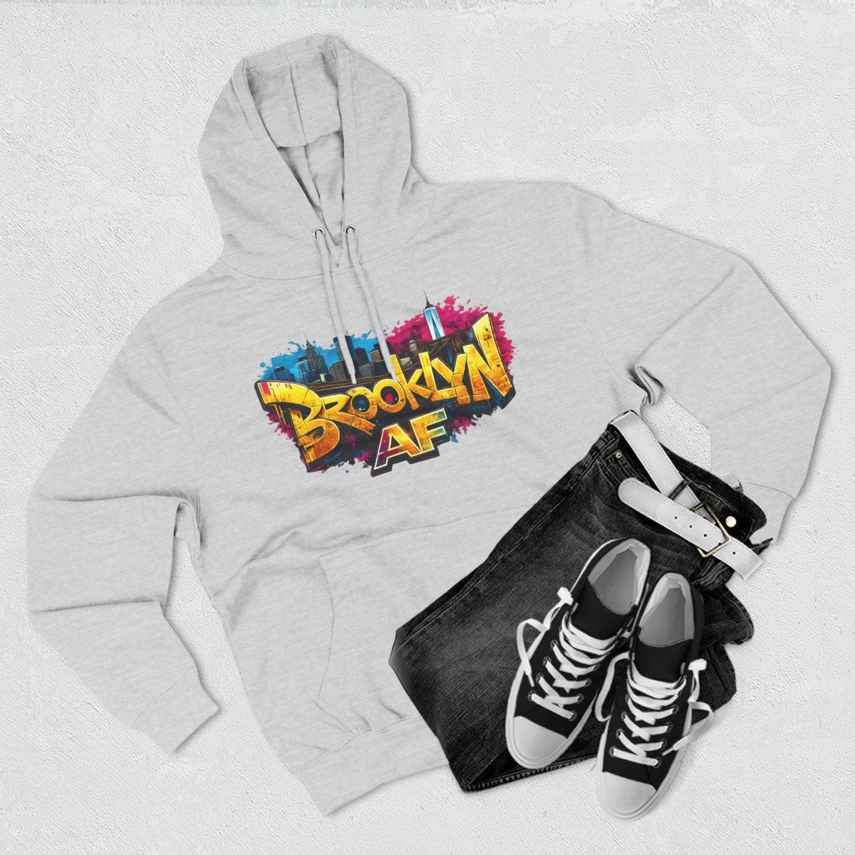 Heather Grey Brooklyn AF graffiti hoodie styled flat with black sneakers