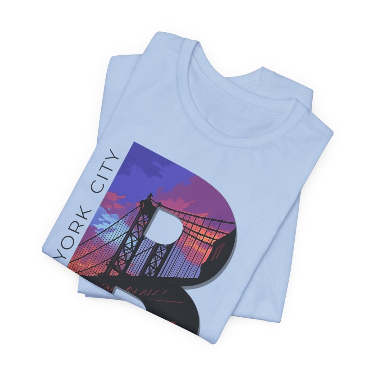 Light Blue Brooklyn AF tee folded in a stack, skyline B graphic on top