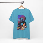 Ocean Blue Brooklyn AF tee on a wooden hanger against a white wall