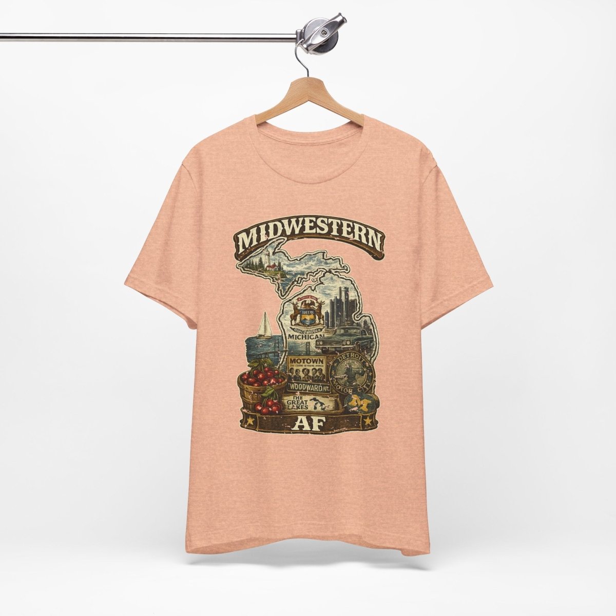 Heather Peach Michigan Midwestern AF tee hanging on a wooden hanger
