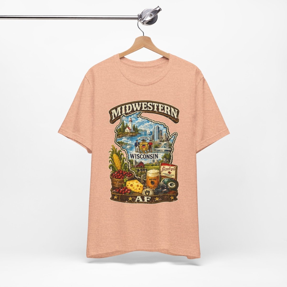 Heather Peach Wisconsin Midwestern AF tee hanging on a wooden hanger