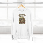 White Missouri Midwestern As Fuck hoodie on a wooden hanger by a window