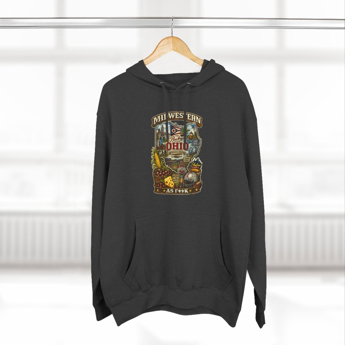 Charcoal Heather Ohio Midwestern As F**K hoodie on a wooden hanger by a window