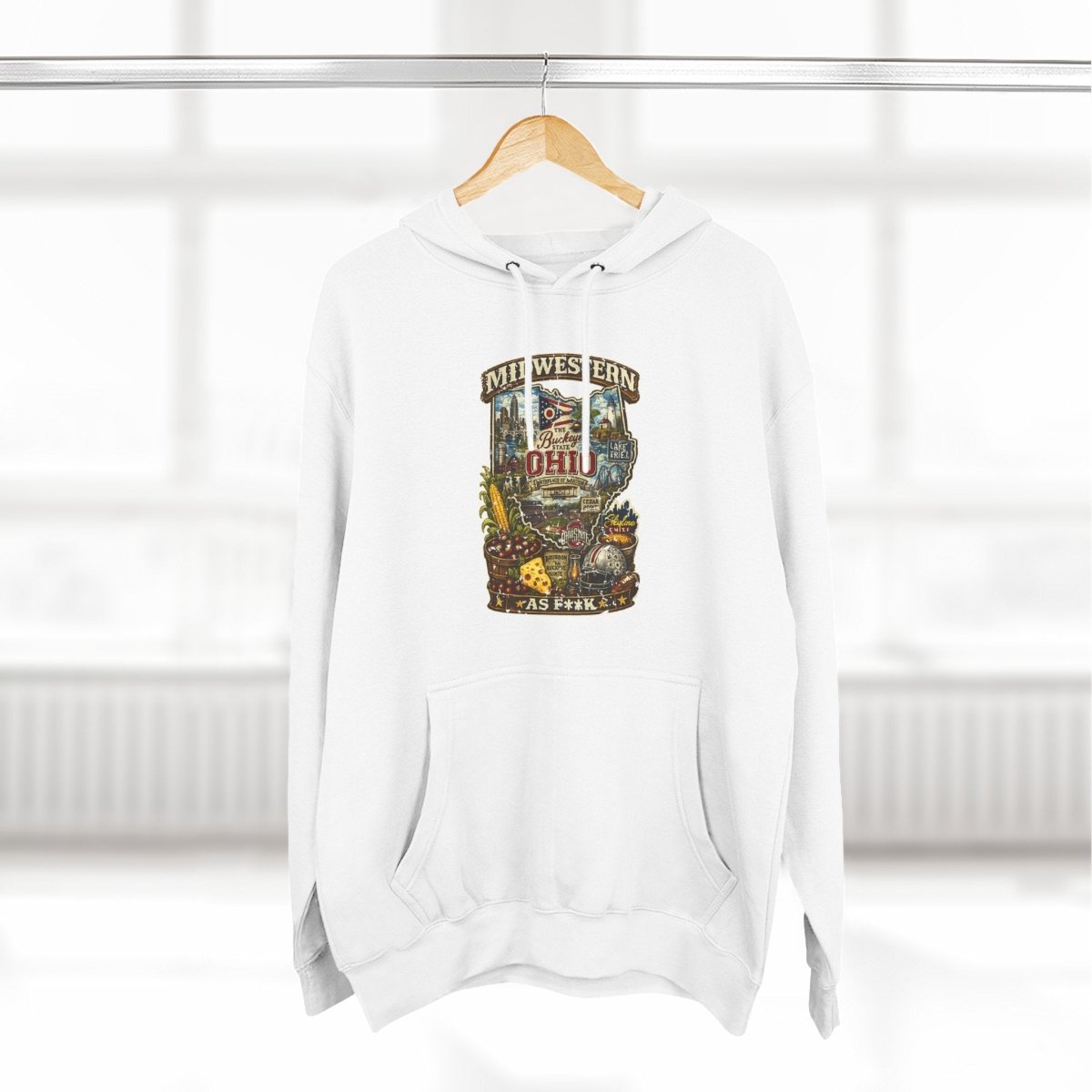 White Ohio Midwestern As F**K hoodie on a wooden hanger by a window